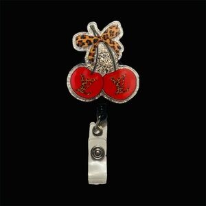 Leopard Bow and Red Cherry Badge Reel